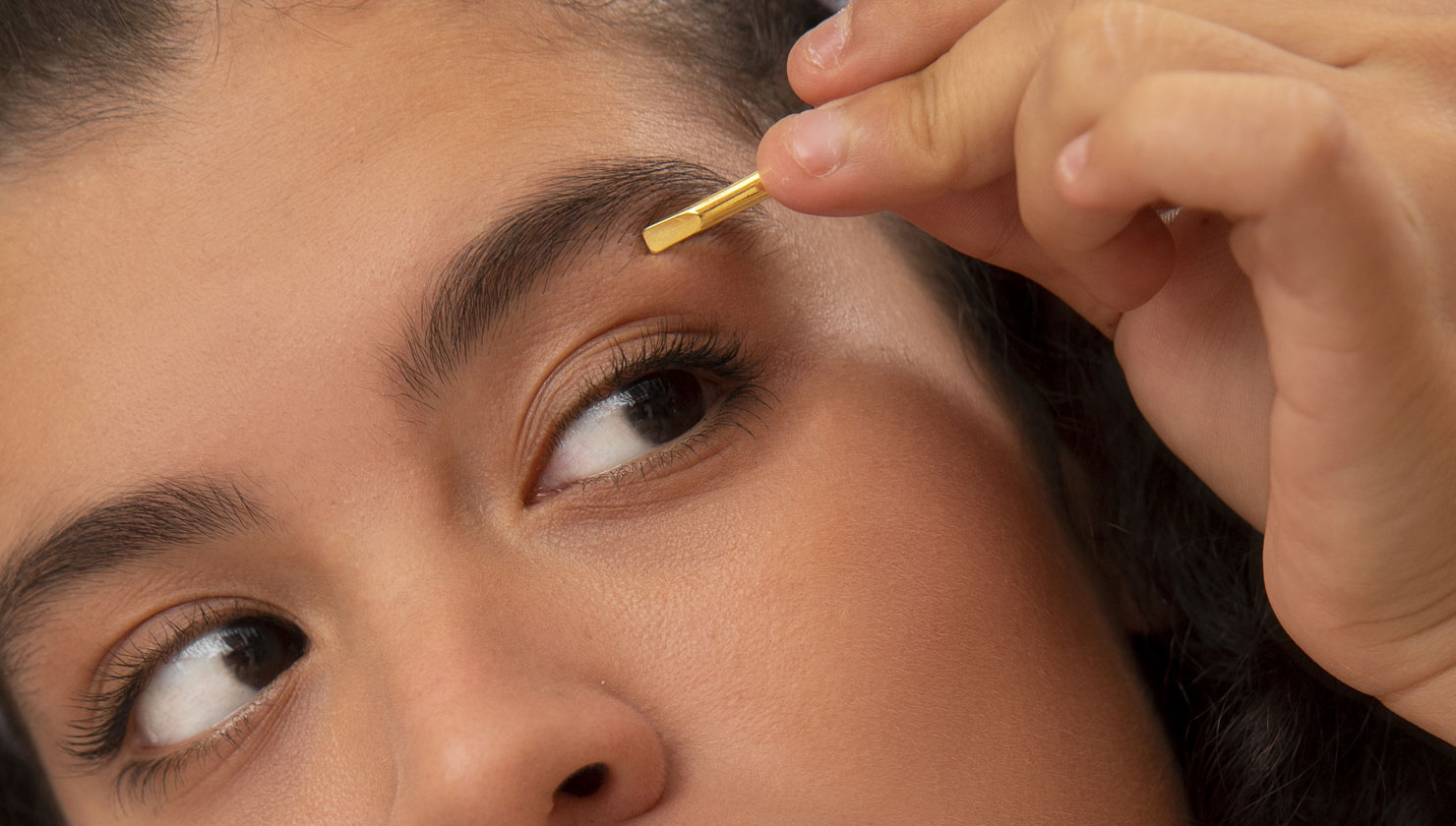 Tweezing - DIY hair removal with tweezers - if painful and ineffective. | Woman's face with tweezers shown.